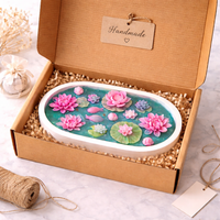 Handmade lotus pond theme candle by Candleroma with flowers and lily pads
